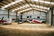 Aircraft hangar with clearlight and bird=proof rafters