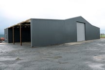 This farm storage shed has a lean-to for additional storage