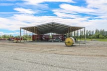 Moving large machinery is easy with this tall clearspan shed