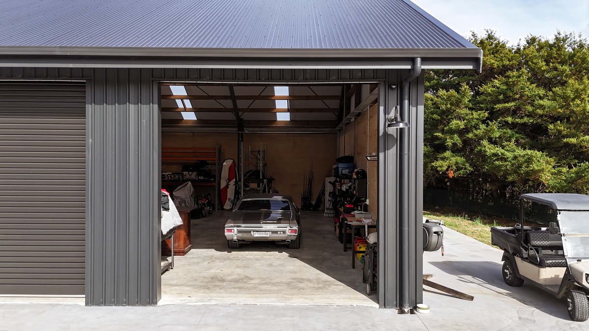 Classic car stored in customised Alpine kitset shed